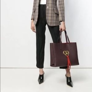 Sold Valentino Garavani large V-ring shopper tote.
